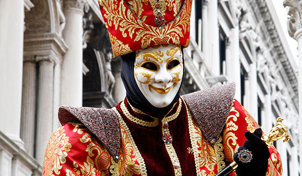 man masked as a court jester for the Venice carnival
