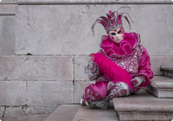Man wearing modern Jester pink costume